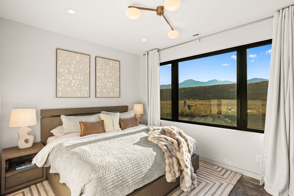 Second king bedroom with a view of the valley and the mountains