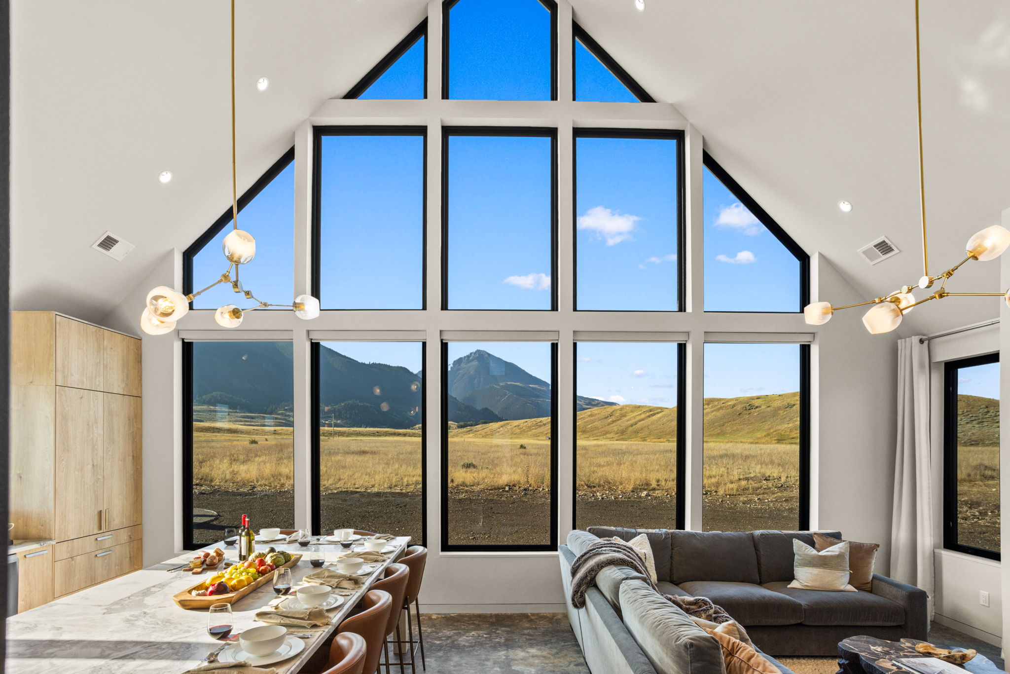 Interior gable window wall — full height mountain view